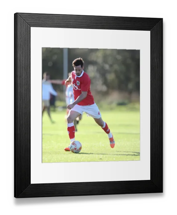 Framed Print : Bristol City's Gregg Cunningham in Action against Colchester in Youth Development League