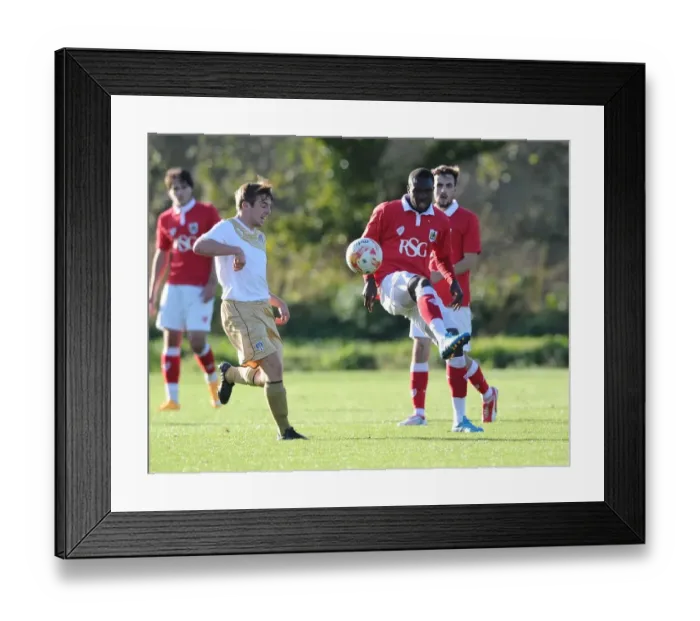 Framed Print : Bristol City's Gus Mafuta in Action against Colchester in Training, November 2014 Framed Print : Bristol City's Gus Mafuta in Action against Colchester in Training, November 2014