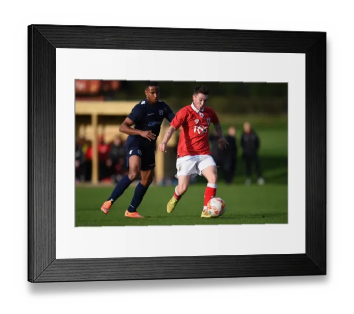 Framed Print : Bristol City's Jamie Horgan Goes Head-to-Head with Millwall in U21 PDL2 Clash Framed Print : Bristol City's Jamie Horgan Goes Head-to-Head with Millwall in U21 PDL2 Clash