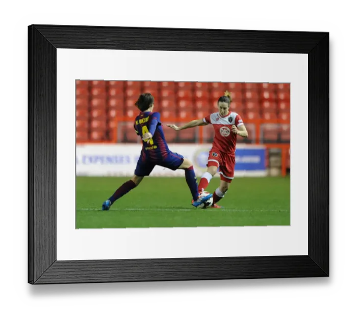 Framed Print : Champions Clash: Corinne Yorston vs. Marta Unzue in the Women's Champions League at Ashton Gate