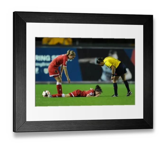 Framed Print : Laura Del Rio Garcia Suffers Injury During Bristol Academy's Match Against FC Barcelona