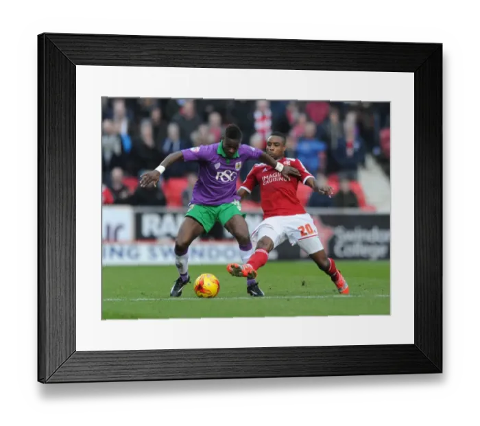 Framed Print : Agard vs. Obika: Intense Rivalry in Swindon Town vs. Bristol City Football Match, November 2014