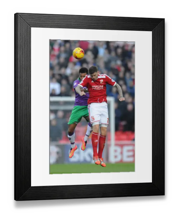 Framed Print : Korey Smith vs Ben Gladwin: Intense Header Battle in Swindon Town vs Bristol City Football Match Framed Print : Korey Smith vs Ben Gladwin: Intense Header Battle in Swindon Town vs Bristol City Football Match