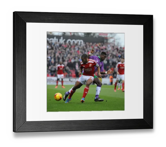Framed Print : Bristol City's Kieran Agard Closes In on Swindon Town's Nathan Thompson in Sky Bet League One Clash Framed Print : Bristol City's Kieran Agard Closes In on Swindon Town's Nathan Thompson in Sky Bet League One Clash