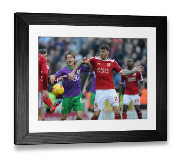 Framed Print : Bristol City's Luke Freeman Fouled by Swindon Town's Ben Gladwin during Swindon Town vs. Bristol City, Sky Bet League One Match Framed Print : Bristol City's Luke Freeman Fouled by Swindon Town's Ben Gladwin during Swindon Town vs. Bristol City, Sky Bet League One Match