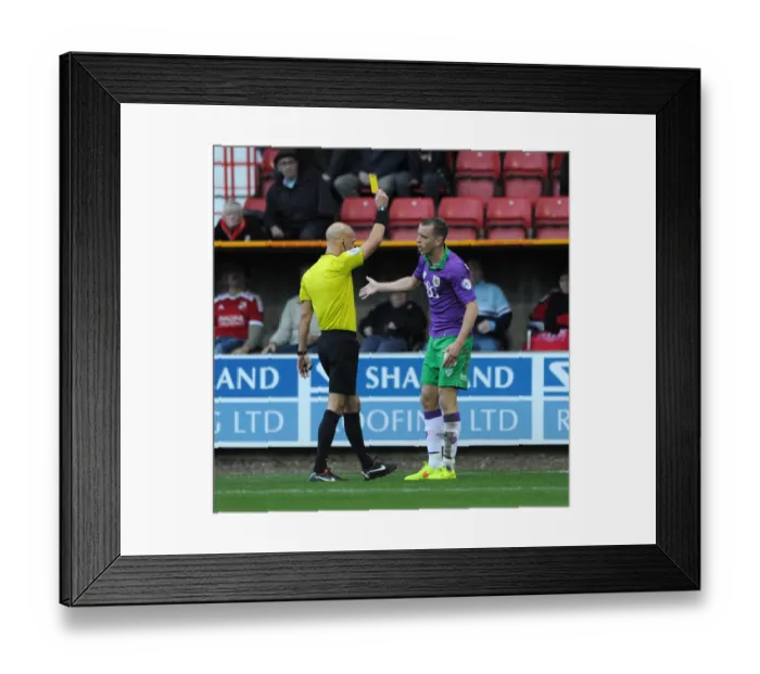 Framed Print : Bristol City's Aaron Wilbraham Receives Yellow Card in Swindon Town vs. Bristol City Football Match Framed Print : Bristol City's Aaron Wilbraham Receives Yellow Card in Swindon Town vs. Bristol City Football Match