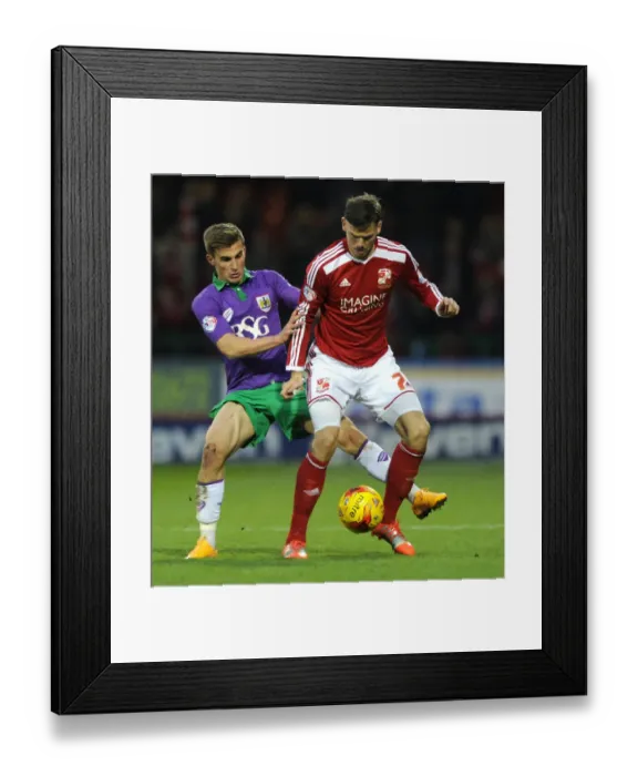 Framed Print : Bristol City's Joe Bryan Closes In on Swindon Town's Ben Gladwin during Sky Bet League One Match Framed Print : Bristol City's Joe Bryan Closes In on Swindon Town's Ben Gladwin during Sky Bet League One Match