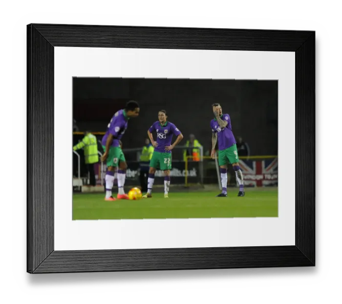 Framed Print : Aden Flint's Disappointment: Swindon Town Stuns Bristol City in League One Framed Print : Aden Flint's Disappointment: Swindon Town Stuns Bristol City in League One