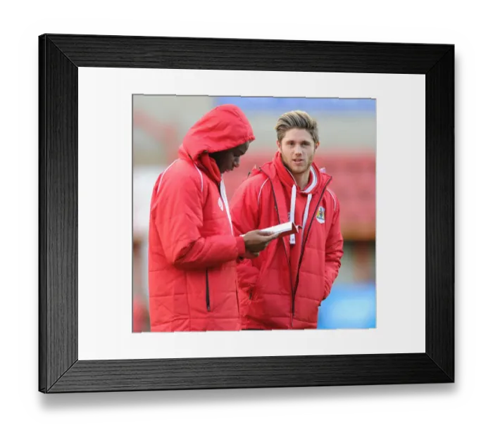 Framed Print : Bristol City Footballers Wes Burns and Jordan Wynter Reviewing Match Program Before Swindon Town Game, November 2014 Framed Print : Bristol City Footballers Wes Burns and Jordan Wynter Reviewing Match Program Before Swindon Town Game, November 2014
