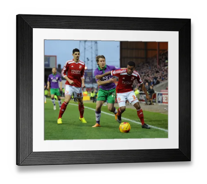 Framed Print : Bristol City's Luke Freeman Closes In on Swindon Town's Nathan Byrne during Sky Bet League One Match Framed Print : Bristol City's Luke Freeman Closes In on Swindon Town's Nathan Byrne during Sky Bet League One Match