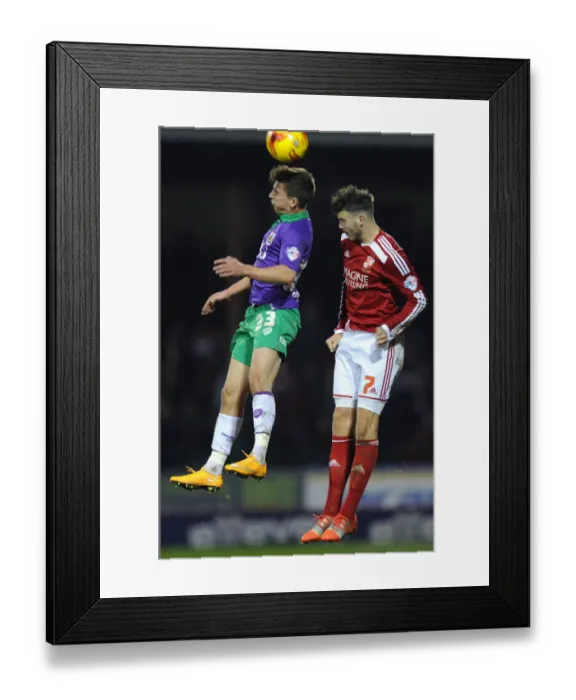 Framed Print : Bristol City vs Swindon Town: Joe Bryan vs Ben Gladwin Heading Battle