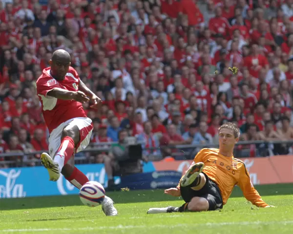 Celebrating Promotion: Dele Adebola's Triumphant Moment at the Play-Off Final