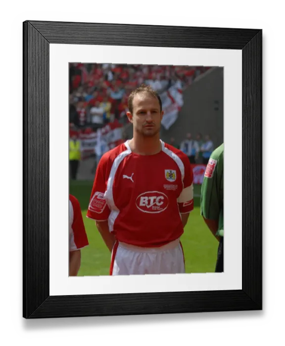 Framed Print : Bristol City's Louis Carey: Celebrating Promotion in the Play-Off Final