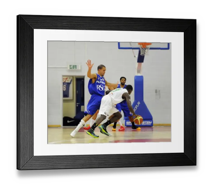 Framed Print : Intense Rivalry on the Basketball Court: McLaughlin-Williams vs. George - Bristol Flyers vs. Plymouth Raiders