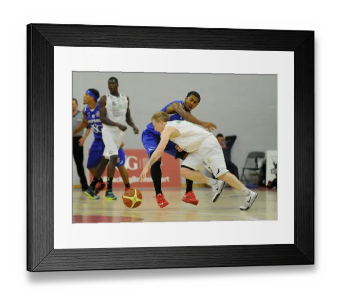 Framed Print : Intense Rivalry on the Basketball Court: Flyers vs. Raiders at SGS Wise Campus, September 2014