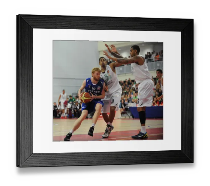 Framed Print : Intense Rivalry: Flyers vs. Raiders - Mathias Seilund's Focus during Bristol Academy Basketball Match Framed Print : Intense Rivalry: Flyers vs. Raiders - Mathias Seilund's Focus during Bristol Academy Basketball Match