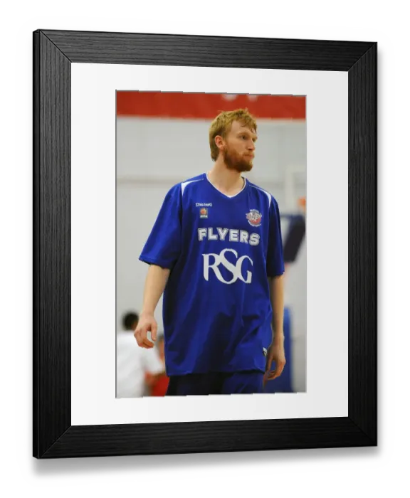 Framed Print : Intense Rivalry: Flyers vs. Raiders - Mathias Seilund's Focus during the Basketball Clash Framed Print : Intense Rivalry: Flyers vs. Raiders - Mathias Seilund's Focus during the Basketball Clash