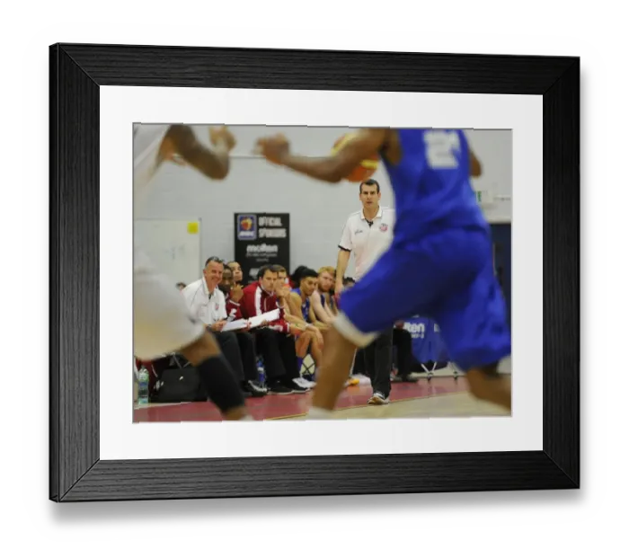 Framed Print : Andreas Kapoulas Leads the Charge: Intense Basketball Action at SGS Wise Campus - Flyers vs. Raiders