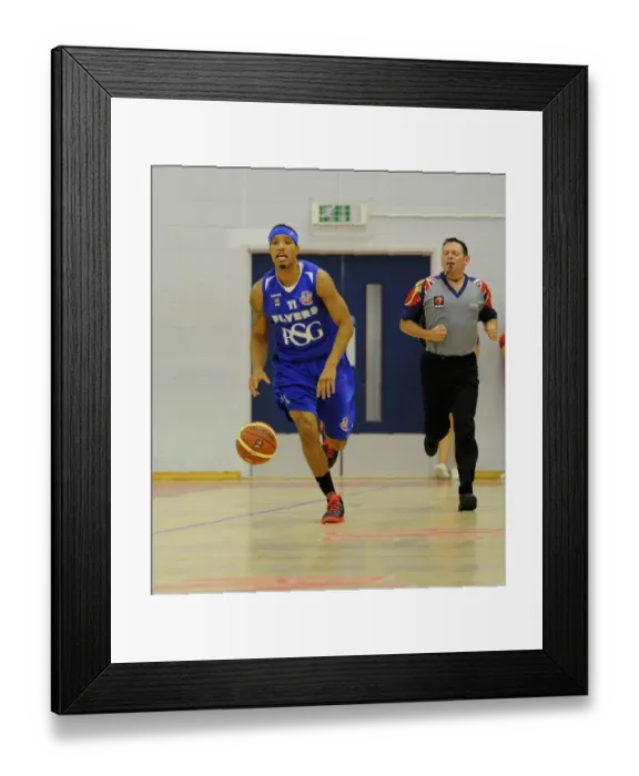 Framed Print : Thrilling Basketball Showdown: Flyers vs. Raiders at SGS Wise Campus (September 2014)