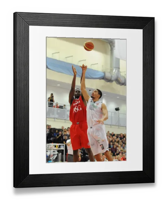 Framed Print : Intense Rivalry: Flyers vs. Raiders Basketball Clash at Wise Campus - A Fight for the Ball