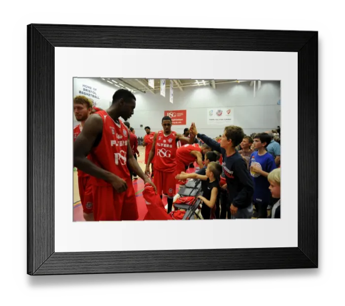 Framed Print : Bristol Flyers Doug Herring and Excited Fan Celebrate in British Basketball Cup Match Framed Print : Bristol Flyers Doug Herring and Excited Fan Celebrate in British Basketball Cup Match