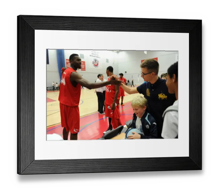 Framed Print : Bristol Flyers Alif Bland Connects with Excited Fan Amidst BBL Cup Action Framed Print : Bristol Flyers Alif Bland Connects with Excited Fan Amidst BBL Cup Action