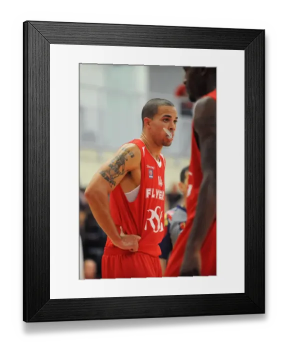 Framed Print : Intense Rivalry: Flyers vs. Raiders in British Basketball Cup at Wise Campus