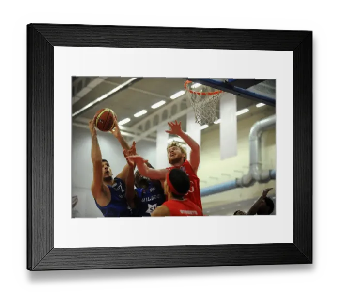 Framed Print : Bristol Flyers: Mathias Seilund's Intense Battle for the Ball Framed Print : Bristol Flyers: Mathias Seilund's Intense Battle for the Ball