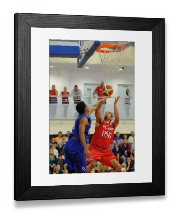 Framed Print : Intense Basketball Showdown: Flyers vs. Wildcats