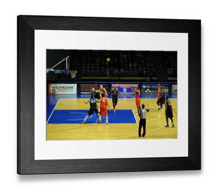 Framed Print : Intense Moment: Alif Bland of Bristol Flyers Faces Off Against the Net Framed Print : Intense Moment: Alif Bland of Bristol Flyers Faces Off Against the Net