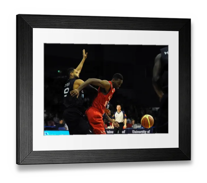 Framed Print : Intense Action: Alif Bland of Bristol Flyers vs. Wolves Defense during British Basketball League Cup Match Framed Print : Intense Action: Alif Bland of Bristol Flyers vs. Wolves Defense during British Basketball League Cup Match