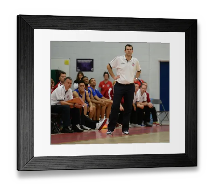 Framed Print : Andreas Kapoulas Leads the Charge: Intense Moment from Bristol Flyers vs. Sheffield Sharks Basketball Game