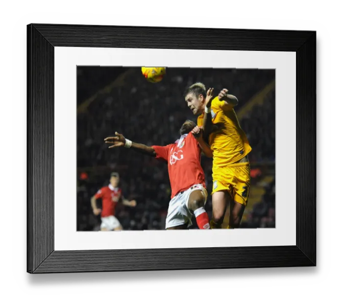Framed Print : Intense Rivalry: Agard vs Hugill Clash at Ashton Gate - Football Showdown between Bristol City's Kieran Agard and Preston North End's Jordan Hugill