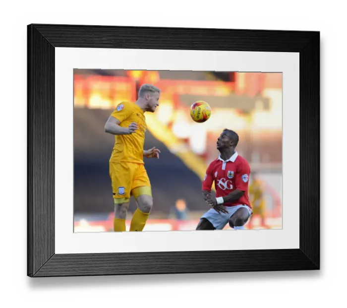 Framed Print : Clash at Ashton Gate: Agard vs. Clarke in Bristol City vs. Preston North End Football Match, 2014