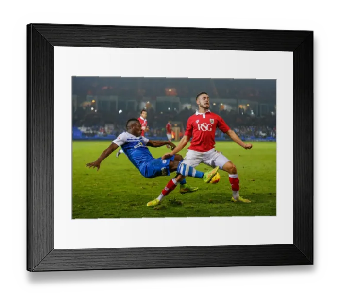 Framed Print : Derrick Williams vs Aaron McLean: Intense Clash at ABAX Stadium - Peterborough United vs Bristol City, Sky Bet League 1
