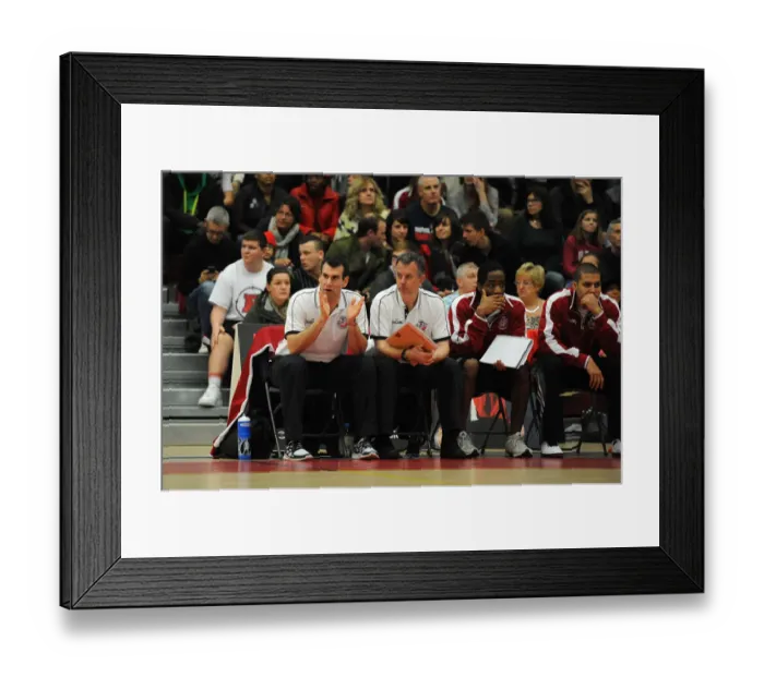 Framed Print : Intense Focus: Coach Kapoulas Leads the Way for Bristol Flyers in Basketball Showdown