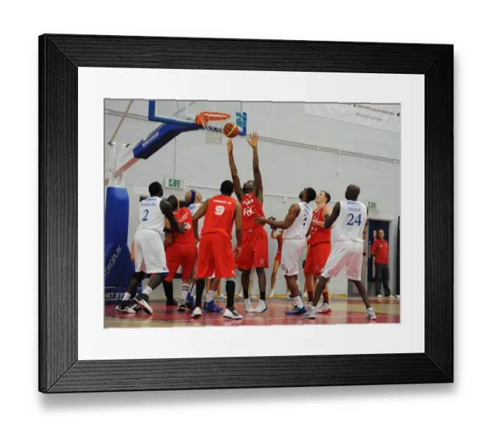 Framed Print : Bristol Flyers Alif Bland Blocks Determinedly Against Cheshire Phoenix in Basketball Action
