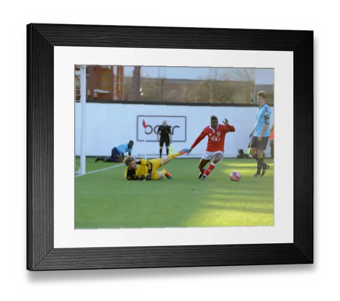 Framed Print : Agard Thwarted by Hedge: Denying the Goal for AFC Telford in FA Cup Clash Framed Print : Agard Thwarted by Hedge: Denying the Goal for AFC Telford in FA Cup Clash