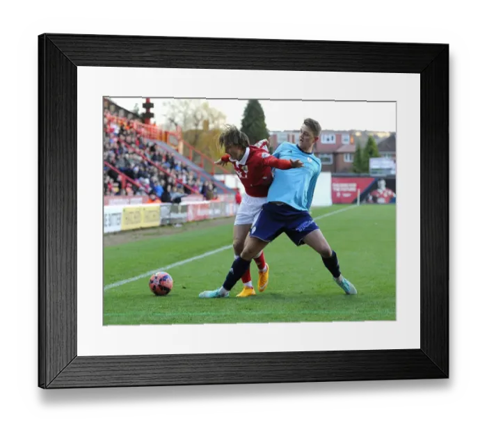Framed Print : Intense Moment: Luke Freeman Defends His Shirt from Kristian Platt during FA Cup Clash Framed Print : Intense Moment: Luke Freeman Defends His Shirt from Kristian Platt during FA Cup Clash