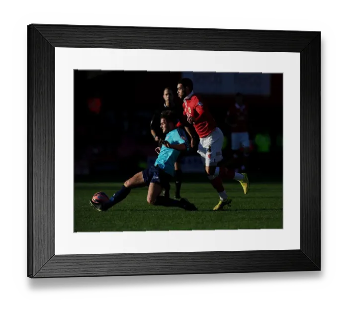 Framed Print : Intense FA Cup Battle: Derrick Williams Fights for Ball Framed Print : Intense FA Cup Battle: Derrick Williams Fights for Ball