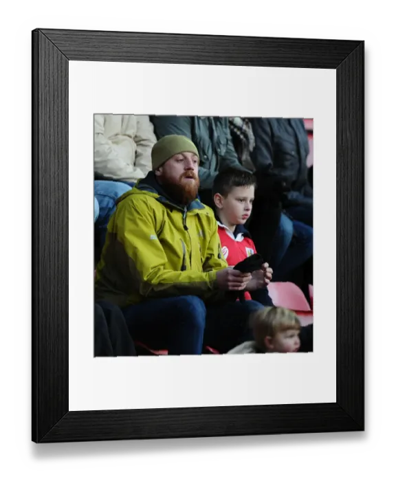 Framed Print : Passionate FA Cup Moment: A Bristol City Fan's Devotion at Ashton Gate