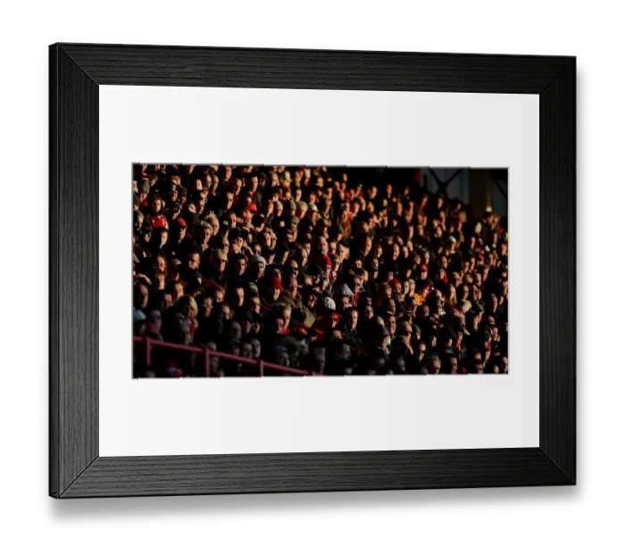Framed Print : Bristol City Football Club: Fans in the Dolman Stand Bask in the Setting Sun during FA Cup Match against AFC Telford United Framed Print : Bristol City Football Club: Fans in the Dolman Stand Bask in the Setting Sun during FA Cup Match against AFC Telford United