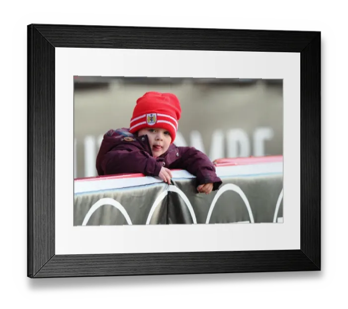 Framed Print : Young Fan's Thrill at FA Cup Match: Bristol City vs AFC Telford United