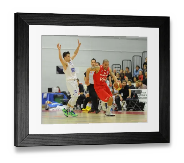 Framed Print : Bristol Flyers Doug McLaughlin-Williams Charges Forward Against Surrey United in Basketball Action Framed Print : Bristol Flyers Doug McLaughlin-Williams Charges Forward Against Surrey United in Basketball Action
