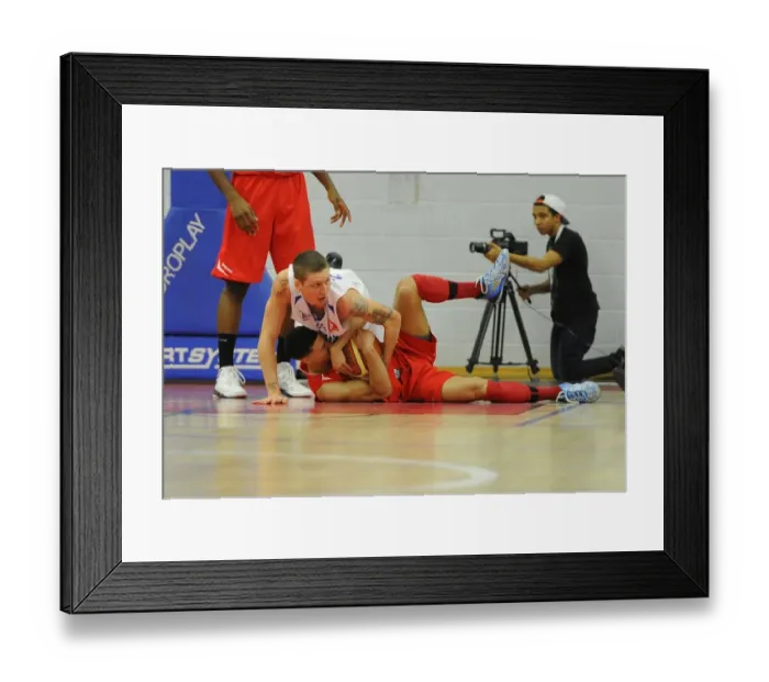 Framed Print : Intense Basketball Showdown: Roy Owen's Battle for Control Framed Print : Intense Basketball Showdown: Roy Owen's Battle for Control