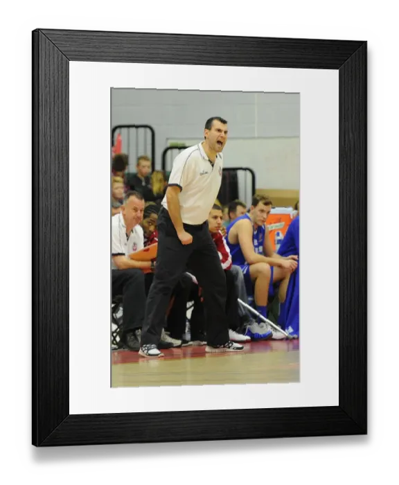 Framed Print : Andreas Kapoulas Leads Intense Action: Flyers vs. Eagles Basketball Showdown