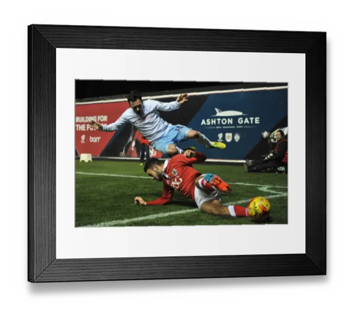 Framed Print : Bristol City's Derrick Williams Tackles Coventry City's Danny Swanson: A Moment from the Johnstones Paint Trophy Match at Ashton Gate Stadium Framed Print : Bristol City's Derrick Williams Tackles Coventry City's Danny Swanson: A Moment from the Johnstones Paint Trophy Match at Ashton Gate Stadium