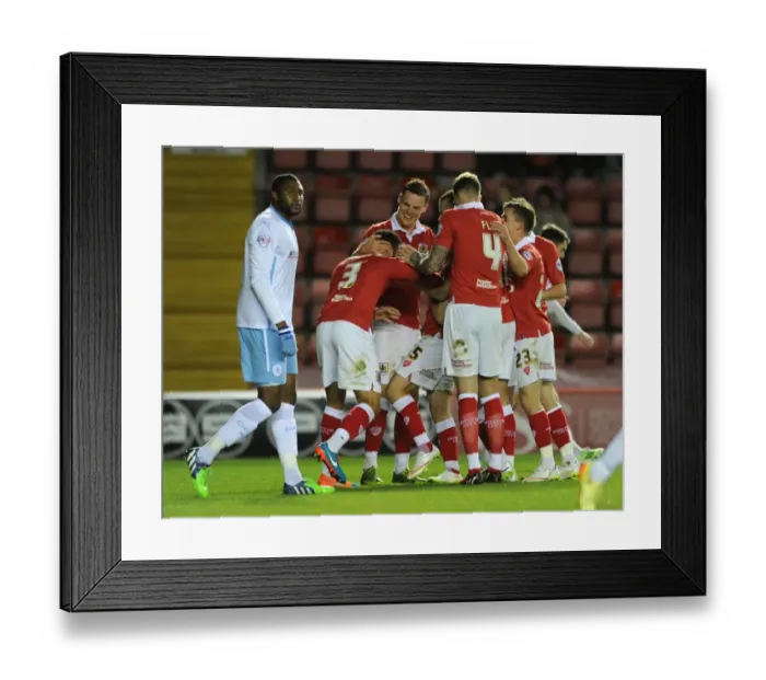 Framed Print : Bristol City Celebrates Win: Derrick Williams Scores the Game-winning Goal Against Coventry City at Ashton Gate Stadium