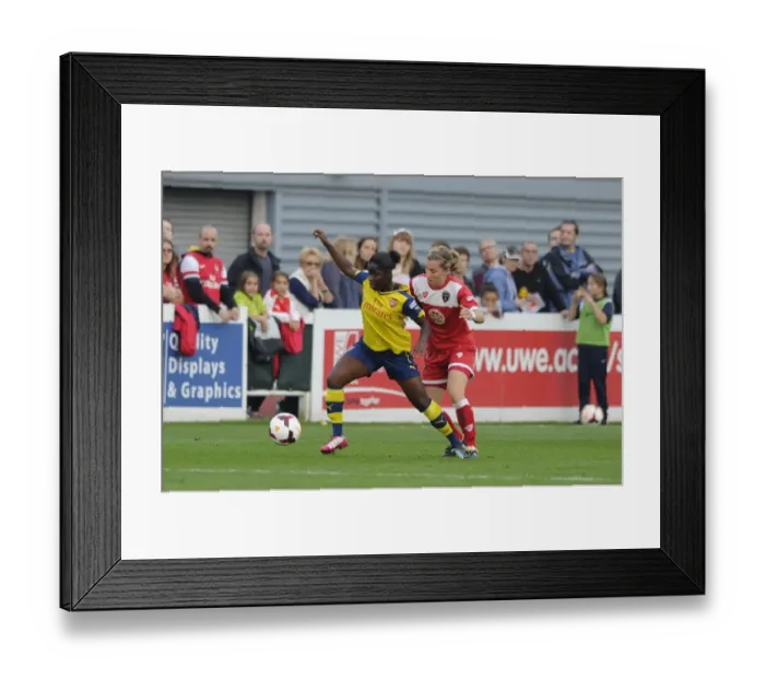 Framed Print : Grace McCarthy vs Danielle Carter: Intense Moment in BAWFC vs Arsenal Ladies FA WSL Match, 2014