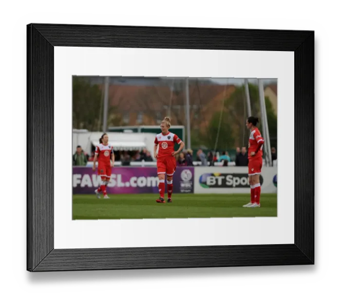 Framed Print : Bristol Academy Players Show Dejection After Going 2-0 Down Against Chelsea Ladies